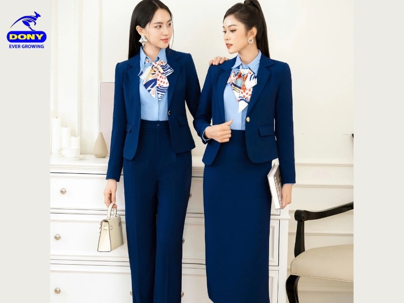 Mẫu 9: Đồng phục vest giáo viên xanh navy phối sơ mi và khăn quàng